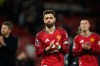 FILE - Manchester United's Bruno Fernandes walks off the pitch after the Premier League soccer match between Manchester United and Leeds in Manchester, England, April 13, 2026. (AP Photo/Dave Thompson, File)