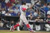 Boston Red Sox's Jarren Duran watches after hitting a grand slam during the 11th inning of a baseball game against the Miami Marlins, Tuesday, Aug. 25, 2026, in Miami. (AP Photo/Lynne Sladky)