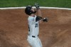 Chicago White Sox's Tristan Peters gestures after hitting a home run against the Texas Rangers during the sixth inning of a baseball game Tuesday, Aug. 25, 2026, in Chicago. (AP Photo/David Banks)