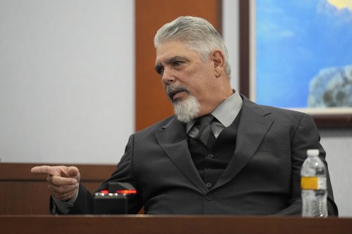 Robert Ladd, a former Compton, Calif., police officer who was part of the department's gang unit, testifies during the trial for Duane Davis, related to the 1996 killing of rapper Tupac Shakur, at Clark County District Court Regional Justice Center in Las Vegas, Tuesday, Aug. 25, 2026. (AP Photo/John Locher, Pool)