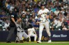 Milwaukee Brewers' Cooper Pratt (12) reacts after striking out during the ninth inning of a baseball game against the Pittsburgh Pirates, Monday, Aug. 3, 2026, in Milwaukee. (AP Photo/Aaron Gash)