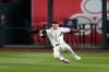 Arizona Diamondbacks right fielder Corbin Carroll makes a diving catch on a line drive hit by Chicago Cubs' Pedro Ramírez during the second inning of a baseball game, Tuesday, Aug. 25, 2026, in Phoenix. (AP Photo/Ross D. Franklin)