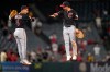 Cleveland Guardians' Brayan Rocchio, left, and left fielder Steven Kwan celebrate after the Guardians defeated the Los Angeles Angels in a baseball game Tuesday, Aug. 25, 2026, in Anaheim, Calif. (AP Photo/Mark J. Terrill)