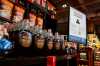 A sign advising that products from the U.S. affected by a tariff will be marked with a symbol at the shelf, along with a QR code linking to a Government of Canada website, is seen beside a display of Canadian products in a grocery store in Ottawa, on Wednesday, April 2, 2025. THE CANADIAN PRESS/Justin Tang