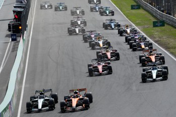 Mercedes driver Andrea Kimi Antonelli of Italy, left, and McLaren driver Lando Norris of Britain lead at the second start during the Formula One Dutch Grand Prix in Zandvoort , Netherlands, Sunday, Aug. 23, 2026. (AP Photo/Darko Bandic)