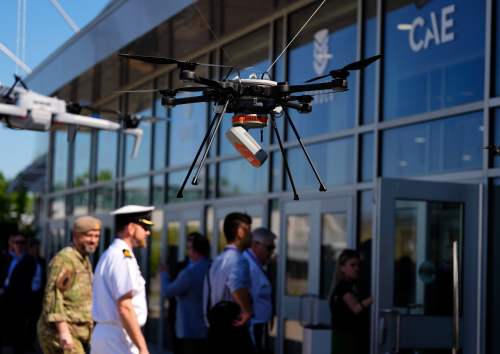 A Skyranger R70 drone is seen at a display as people enter the Canadian Association of Defence and Security Industries annual defence industry trade show CANSEC, in Ottawa, on Wednesday, May 28, 2025. THE CANADIAN PRESS/Justin Tang