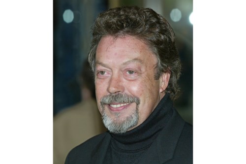 FILE - Actor Tim Curry appears at the Film Society of Lincoln Center's gala tribute to actress Susan Sarandon in New York on May 5, 2003. (AP Photo/Stuart Ramson, File)