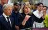 Minister of Industry Melanie Joly speaks as Minister of Finance and National Revenue Francois-Philippe Champagne looks on, during a news conference on Canada's response to U.S. tariffs, at a roofing company in Ottawa, on Tuesday, Aug. 25, 2026. THE CANADIAN PRESS/Justin Tang