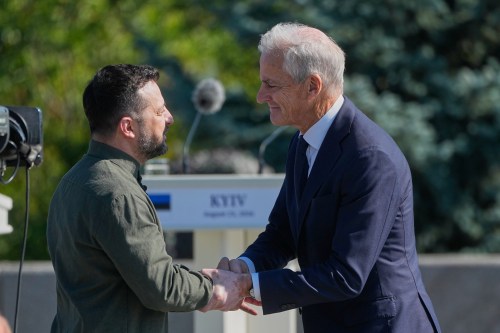 FILE - Ukraine's President Volodymyr Zelenskyy greets Norway's Prime Minister Jonas Gahr Stoere ahead of the flag-raising ceremony to mark the National Flag Day in Kyiv, Ukraine, on Aug. 23, 2026. (AP Photo/Efrem Lukatsky, File)