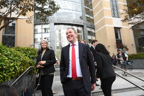 Jason Slothouber, Senior Prosecutor for the Colorado Attorney General's Office, walks outside court after tech giant Meta agreed to pay $17 billion as part of a settlement to end a landmark trial over teen social media addiction on Wednesday, Aug. 26, 2026, in Oakland, Calif. (AP Photo/Noah Berger)