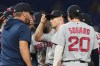 Boston Red Sox starting pitcher Sonny Gray, center, talks on the mound during the second inning of a baseball game against the Miami Marlins, Wednesday, Aug. 26, 2026, in Miami. (AP Photo/Lynne Sladky)