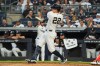 New York Yankees designated hitter Ben Rice hits a solo home run during the first inning of a baseball game against the Houston Astros Wednesday, Aug. 26, 2026, in New York. (AP Photo/Ryan Murphy)
