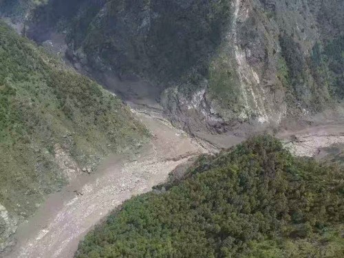 This photo released by Xinhua News Agency, shows a mudslide-hit area near Gyirong Port in southwestern China's Tibetan Autonomous Region on Wednesday, Aug. 26, 2026. (Xinhua via AP)