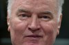 FILE — Bosnian Serb military chief Ratko Mladic enters the Yugoslav War Crimes Tribunal in The Hague, Netherlands, to hear the verdict in his genocide trial, Wednesday, Nov. 22, 2017 (AP Photo/Peter Dejong, Pool, File)