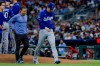Los Angeles Dodgers pitcher Roki Sasaki (11) leaves the game with an injury against the Atlanta Braves during the fourth inning of a baseball game, Wednesday, Aug. 26, 2026, in Atlanta. (AP Photo/Erik S. Lesser)