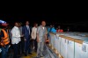 In this photo released by UNICEF, officials inspect doses of Ebola (Zaire) vaccines upon arrival at Ndjili International Airport in Kinshasa, Congo, Friday, Aug. 21, 2026. (Ndomba Mbikayi/UNICEF via AP)