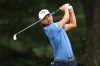 Min Woo Lee plays his tee shot on the third hole during the first round of the Tour Championship golf tournament, Thursday, Aug. 27, 2026, in Atlanta. (AP Photo/Colin Hubbard) CORRECTION: 