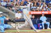 Kansas City Royals slugger Jac Caglianone hits a two-run single during a Major League Baseball game against the Blue Jays in Toronto on Aug. 27, 2026. THE CANADIAN PRESS/Sammy Kogan