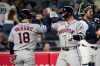 Houston Astros' Christian Walker, right, celebrates his two-run home run with teammate Daulton Varsho (18) during the sixth inning of a baseball game against the New York Yankees Thursday, Aug. 27, 2026, in New York. (AP Photo/Eduardo Munoz Alvarez)
