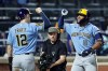Milwaukee Brewers' Jackson Chourio, right, is congratulated by Cooper Pratt (12) after hitting a two-run home run during the eighth inning of a baseball game against the New York Mets Thursday, Aug. 27, 2026, in New York. (AP Photo/Adam Hunger)