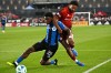 Toronto FC's Kosi Thompson, right, tackles CF Montreal's Dante Sealy (25) during first half MLS soccer action in Toronto on Saturday, August 30, 2025. THE CANADIAN PRESS/Jon Blacker