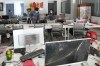 FILE - Thai soldiers inspect a work station at the scam compound in O'Smach, Cambodia, April 7, 2026. (AP Photo/Sakchai Lalit, File)