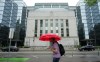 A pedestrian walks past the Bank of Canada in Ottawa, Wednesday, June 10, 2026. THE CANADIAN PRESS/Adrian Wyld