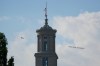 A plane flies over Nashville, Tenn., towing a banner reading “change.org/DollyPartonAirport” as part of an effort to rename the airport after Dolly Parton, Friday, Aug. 28, 2026. (AP Photo/George Walker IV)