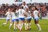 Montreal Roses FC forward Tanya Boychuk (12) is surrounded by her teammates as they celebrate her scoring a goal against AFC Toronto during first half Northern Super League soccer action in Toronto on Saturday, April 19, 2025. THE CANADIAN PRESS/Arlyn McAdorey