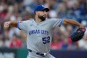 Kansas City Royals' Michael Wacha (52) pitches in the first inning of a baseball game against the Cleveland Guardians in Cleveland, Friday, Aug. 28, 2026. (AP Photo/Sue Ogrocki)
