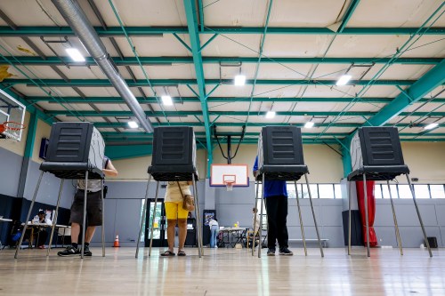 FILE - Voters cast their ballots during the primary election in Windsor, Conn., Aug. 11, 2026. (AP Photo/Rusty Jones, File)