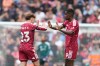 Liverpool's Alexander Isak, right, celebrates with Liverpool's Victor Munoz after scoring his side's opening goal during the English Premier League soccer match between Liverpool and Nottingham Forest in Liverpool, England, Saturday, Aug. 29, 2026. (AP Photo/Jon Super)
