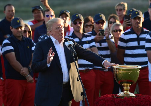 FILE - President Donald Trump speaks before presenting the winner's trophy to the U.S. Team after the final round of the Presidents Cup at Liberty National Golf Club in Jersey City, N.J., Sunday, Oct. 1, 2017. (AP Photo/Susan Walsh,File)
