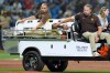 San Diego Padres left fielder Luis Rengifo is carted off the field after getting injured during the seventh inning of a baseball game against the Tampa Bay Rays Saturday, Aug. 29, 2026, in St. Petersburg, Fla. (AP Photo/Chris O'Meara)