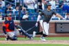 New York Mets' Juan Soto runs after hitting an RBI single against the Houston Astros during the fifth inning of a baseball game, Saturday, Aug. 29, 2026, in New York. (AP Photo/Noah K. Murray)