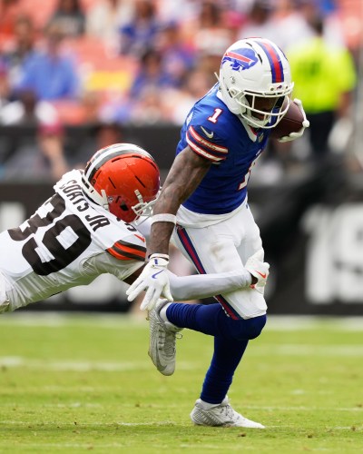 Cleveland Browns cornerback Michael Coats Jr. (39) tackles Buffalo Bills wide receiver Mecole Hardman Jr. (1) during the first half of an NFL preseason football game, Saturday, Aug. 22, 2026, in Cleveland. (AP Photo/Carolyn Kaster)