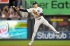 New York Yankees shortstop George Lombard Jr. throws out Boston Red Sox' Caleb Durbin at first base during the eighth inning of a baseball game, Friday, Aug. 28, 2026, in New York. (AP Photo/Yuki Iwamura)