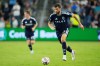 Vancouver Whitecaps' Thomas M¸ller (13) chases the ball during the second half of an MLS soccer match against Sporting Kansas City Saturday, Aug. 29, 2026, in Kansas City, Kan. (AP Photo/Charlie Riedel)