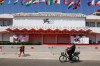FILE - Festival goers pass the red carpet of the 81st edition of the Venice Film Festival in Venice, Italy, Aug. 27, 2024. (Photo by Vianney Le Caer/Invision/AP, File)