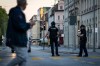 Police officers patrol a street in downtown Aarau, Switzerland Sunday, Aug. 30, 2026, following a shooting at a rave. (Michael Buholzer/Keystone via AP)