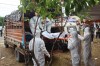 Rescuers carry bodies of flash flood victims for a mass burial in Chitwan, Nepal, Saturday, Aug. 29, 2026. (AP Photo/Nisha Shrestha)