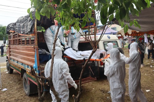 Rescuers carry bodies of flash flood victims for a mass burial in Chitwan, Nepal, Saturday, Aug. 29, 2026. (AP Photo/Nisha Shrestha)