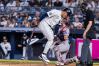 New York Yankees' George Lombard Jr., left, suffers an injury while at-bat in the second inning during the second baseball game of a doubleheader against the Boston Red Sox, Saturday, Aug. 29, 2026, in New York. (AP Photo/Corey Sipkin)
