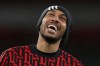FILE - Arsenal's Pierre-Emerick Aubameyang laughs during a warm up before an English Premier League soccer match between Arsenal and Southampton at the Emirates stadium in London, England, Dec. 16, 2020. (Peter Cziborra/Pool via AP, File)