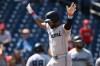 Miami Marlins' Otto Lopez celebrates his two-run home run during the ninth inning of a baseball game against the Washington Nationals, Sunday, Aug. 30, 2026, in Washington. (AP Photo/Nick Wass)