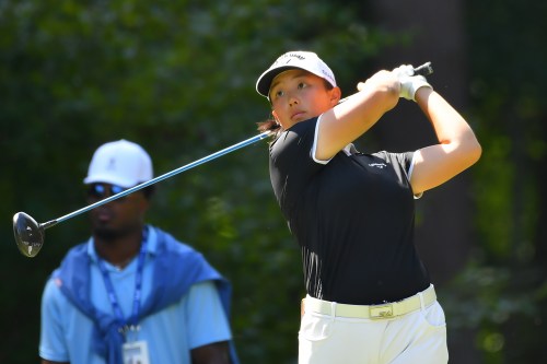 Ruoning Yin, of China, hits off the 2nd tee during the fourth round of the LPGA FM Championship golf tournament, Sunday, Aug. 30, 2026, in Norton, Mass. (AP Photo/Steven Senne)