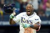 Tampa Bay Rays' Jorge Mateo celebrates his walk off hit against San Diego Padres pitcher David Morgan during the 11th inning of a baseball game Sunday, Aug. 30, 2026, in St. Petersburg, Fla. (AP Photo/Chris O'Meara)