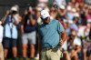 Scottie Scheffler putts on the18th green during the final round of the PGA Tour Championship golf tournament Sunday, Aug. 30, 2026, in Atlanta. (AP Photo/Colin Hubbard)