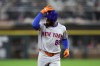 New York Mets' Luis Robert Jr. (88) gestures after hitting a home run during the seventh inning of a baseball game against the Chicago White Sox in Chicago, Saturday, Aug. 22, 2026. (AP Photo/Jessie Alcheh)