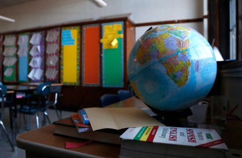 A globe sits in a Peck Elementary School classroom Friday, Feb. 1, 2013, in Chicago. (AP Photo/Charles Rex Arbogast)